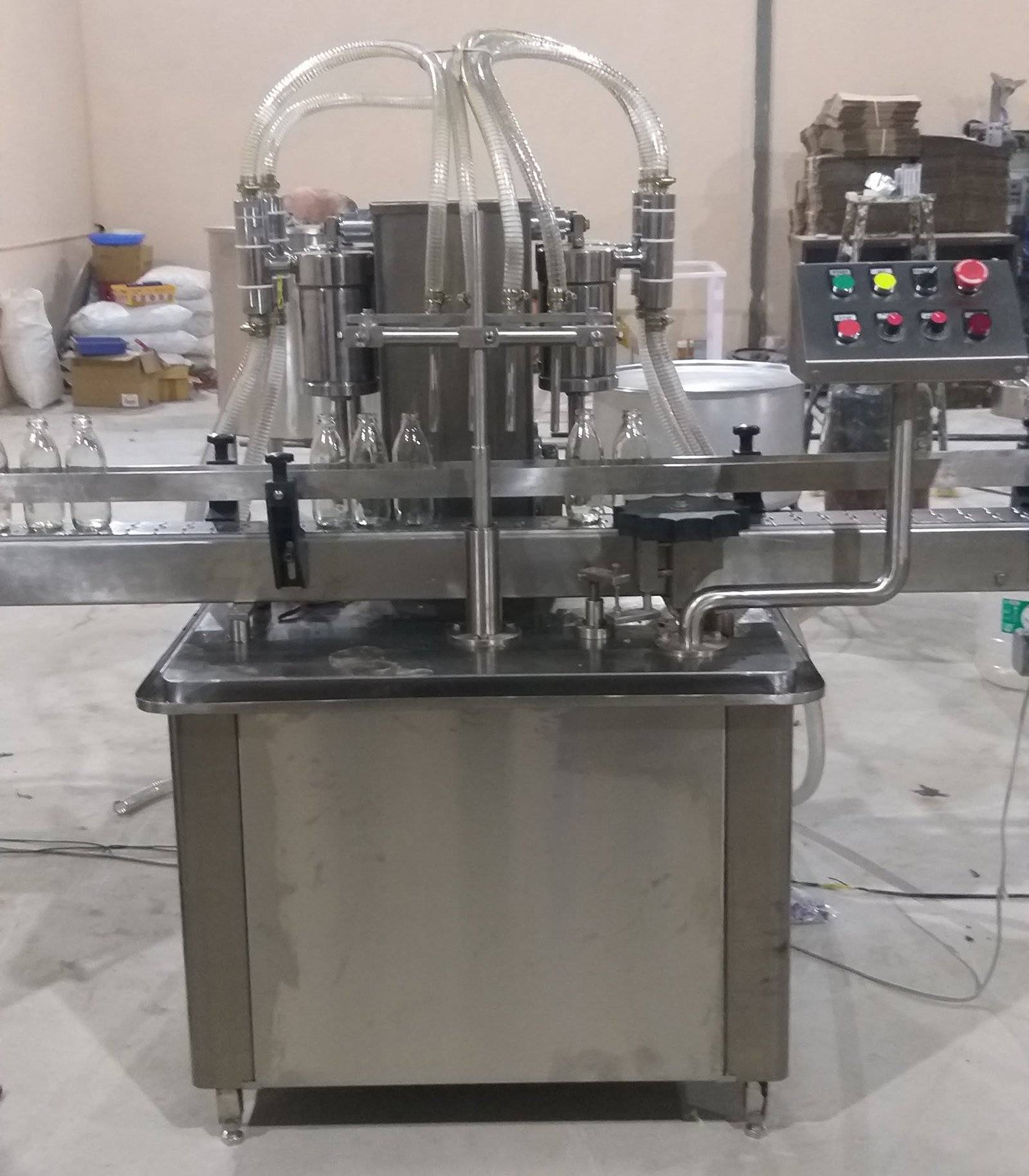 Four Head Volumetric Liquid Filling Machine