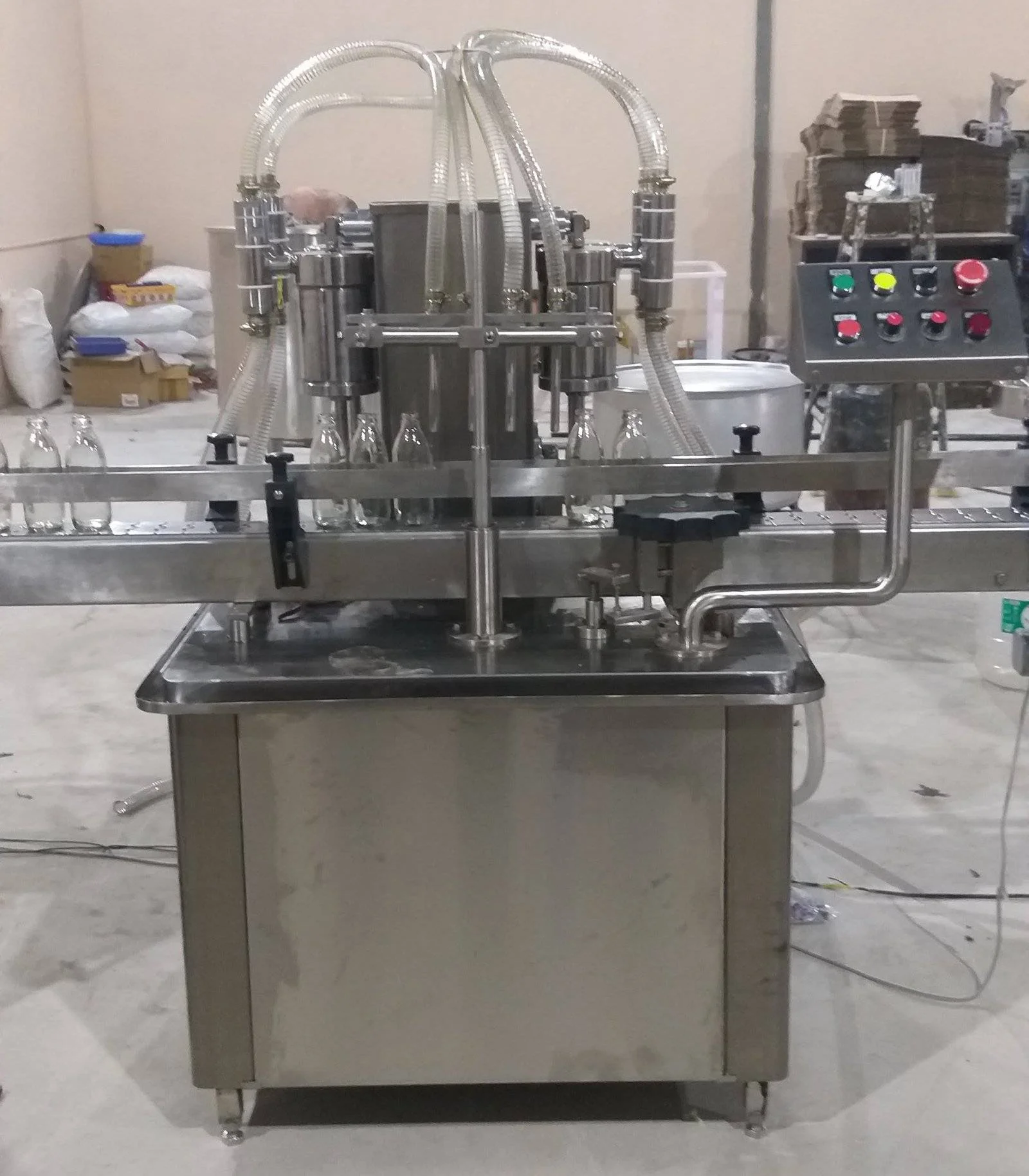 Home 6 Volumetric Liquid Bottle Filling Machine